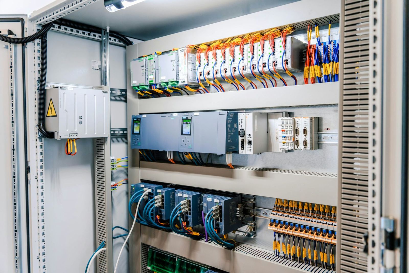Industrial control panel with variable frequency drives and PLC modules
